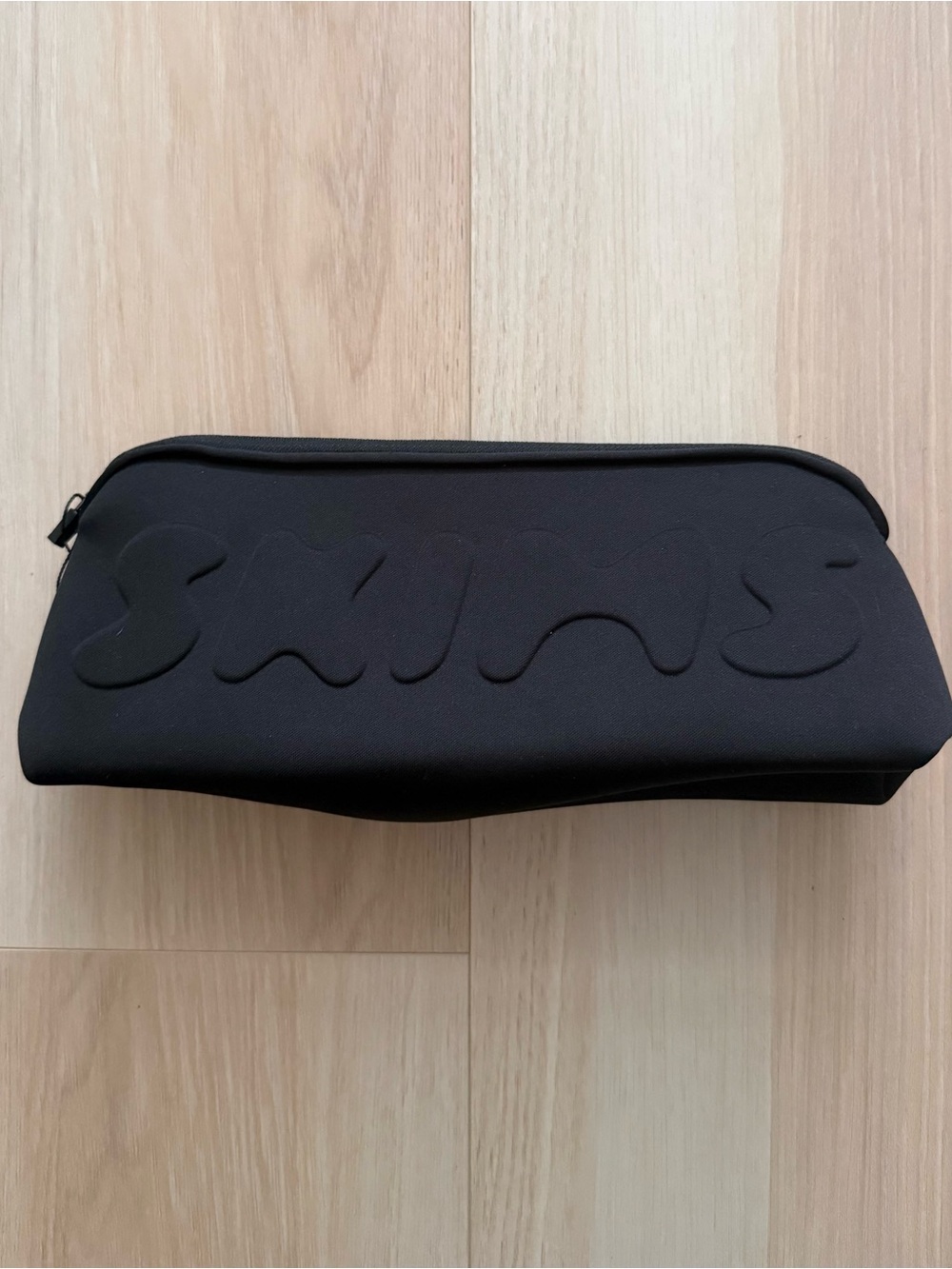 SKIMS Onyx Black Neoprene Embossed Zip Large Pouch Travel Cosmetic Bag